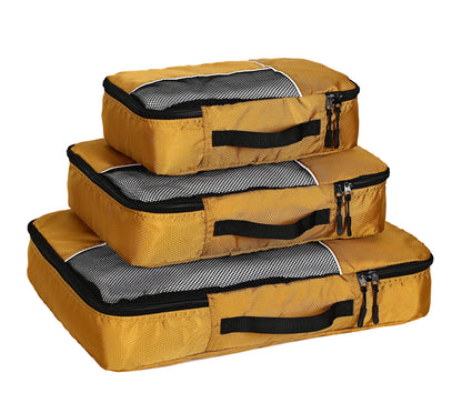 3-piece compression packing cubes set in three sizes laid out together