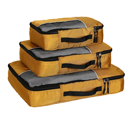 3-piece compression packing cubes set in three sizes laid out together