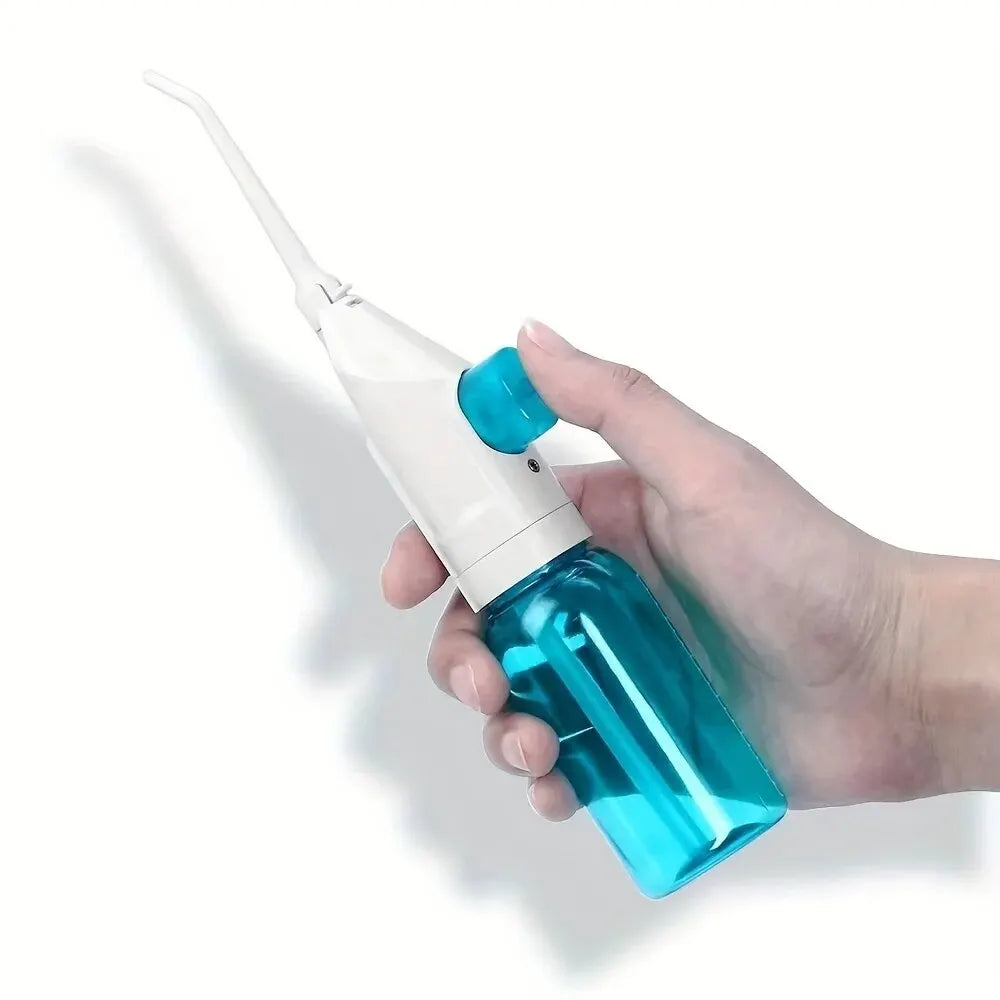 Portable Oral Irrigator – Manual High-Pressure Water Flosser